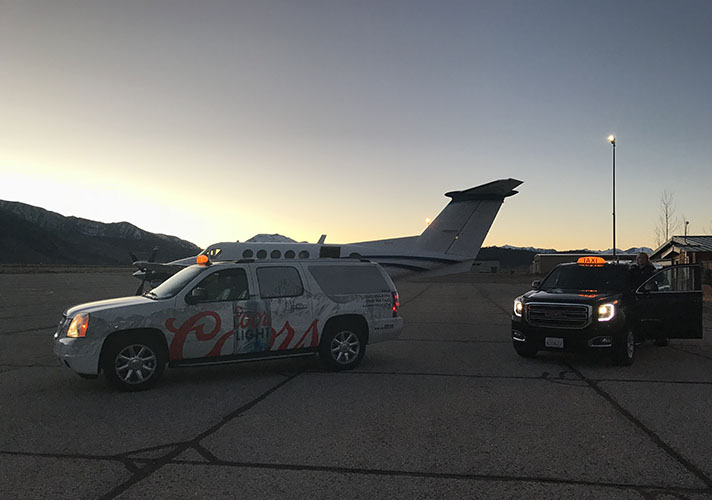 6-mamoth-taxi-airport-dusk